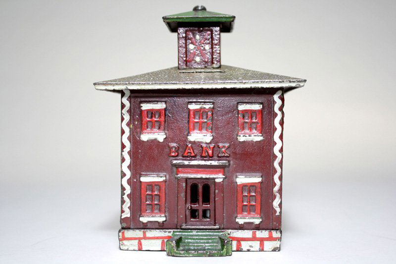 Cupola Bank –Large, Brown with Stencil Paint Roof: Made by Stevens & Brown Connecticut – Circa 1872 This is a virtually mint condition large Cupola, in fact, one of the best examples that we have ever seen. Material: Cast Iron Provenance: Robert Bra