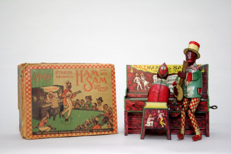 Ham & Sam with Box: Made by Ferdinand Strauss Co. New York, New York – Circa 1925 This is a classic American toy by Ferdinand Strauss. It works well. Material: Tin