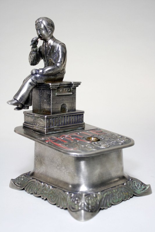 Artie” Mechanized Cigar Cutter: Made by Erie Specialty Company Erie, Pennsylvania – February 19, 1889 The condition of this scarce mechanized cigar cutter is truly amazing. It is pristine plus, bright and works really well. It is 