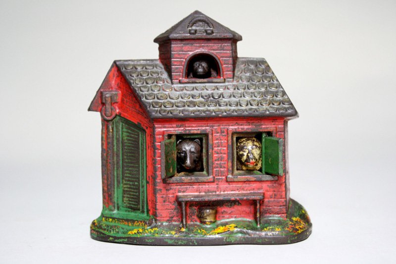 Zoo Bank Mechanical Bank: Made by Kyser & Rex Company Philadelphia, Pennsylvania – Circa 1880 Without a doubt, the Zoo Bank is the smallest and cutest bank ever produced. Place a coin in the roof dormer and press the monkey�