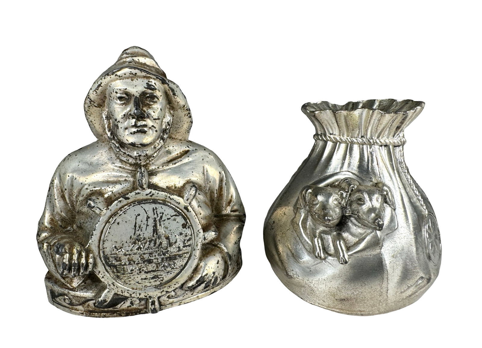 Two Souvenir Banks: Made in Germany circa 1930's. One is 3 1/4" Tall and the other is 4 1/4" Tall.