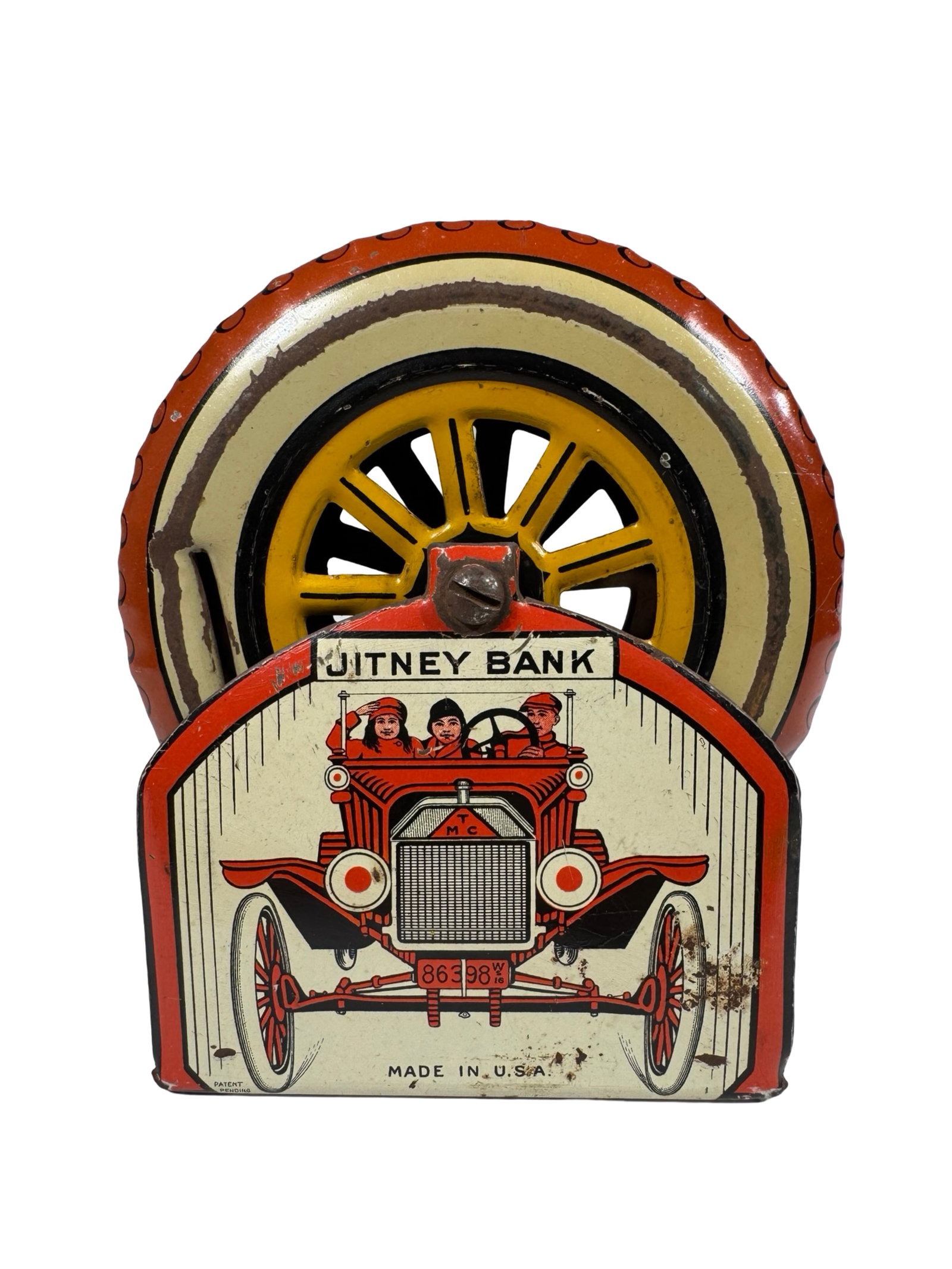 The Jitney Bank: Made in America circa 1920's. 4 3/4" Tall.