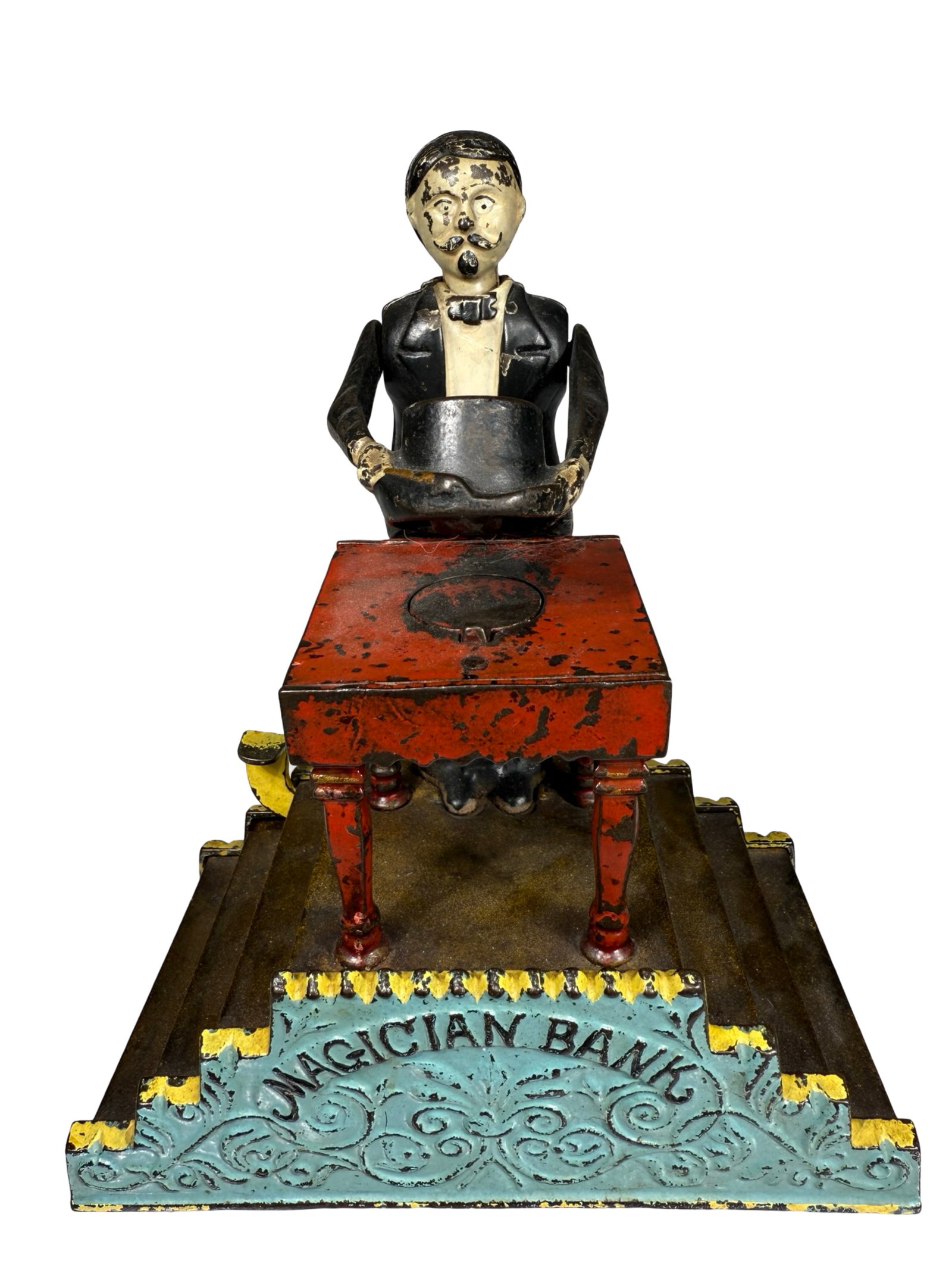 Magician - Cast Iron Mechanical Bank: Designed by Charles Bailey. J. & E. Stevens Company. Cromwell, CT - 1900's.