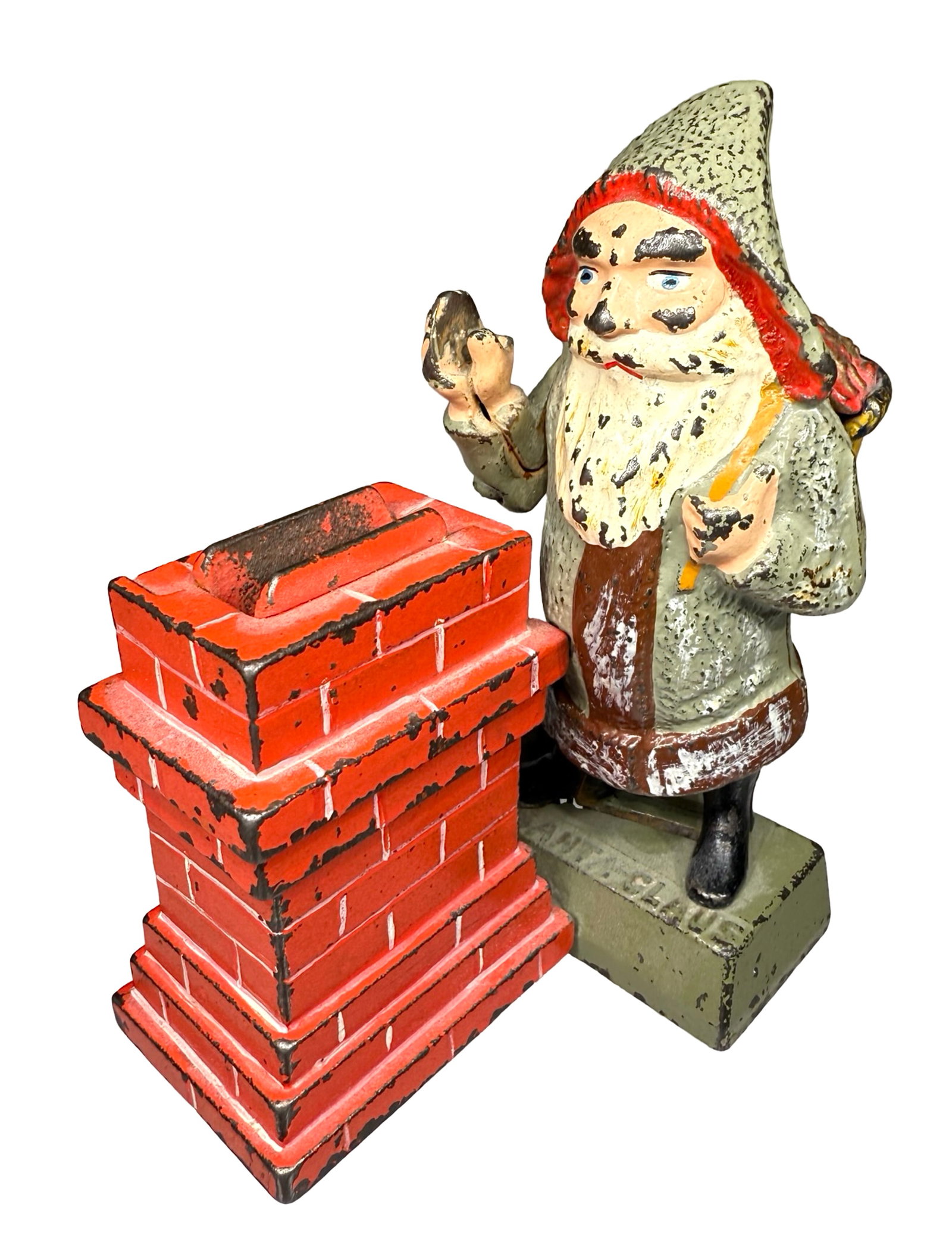 Santa Claus - Cast Iron Mechanical Bank: Made by Shepard Hardware Company. Buffalo, New York 1889. Place a coin in Santa's hand. Depress the lever and he deposits it into the chimney.