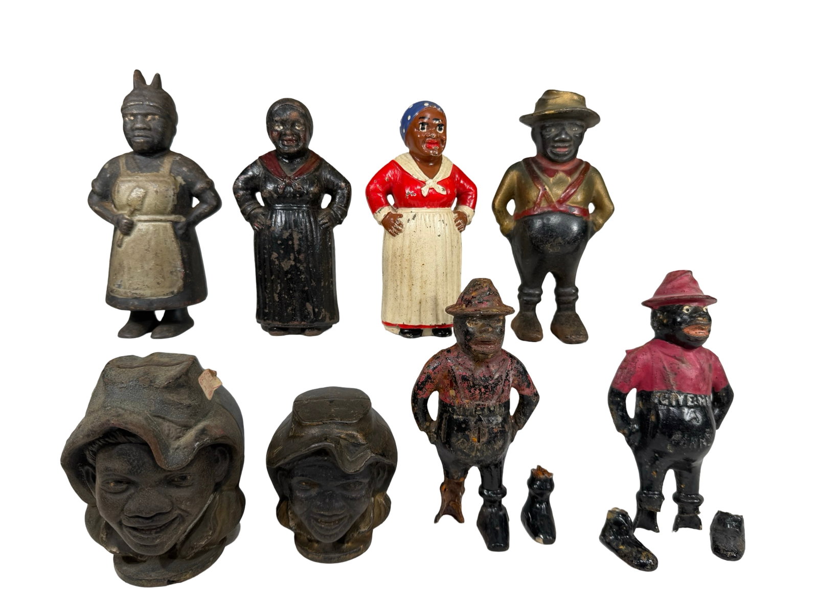 Eight Black Themed Banks: A. C. Williams / Hubley Mfg. Co. American - 1920/30's. Domestic shipping is $40.