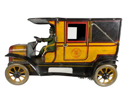 Early Sedan with Boxy Engine: Made by the Burnett Ltd. Company. Great Britain - Early 1910's - 7" Long. This is a genuinely fascinating vehicle that strongly resembles an early taxicab design. Typically, Burnett are found to be ma