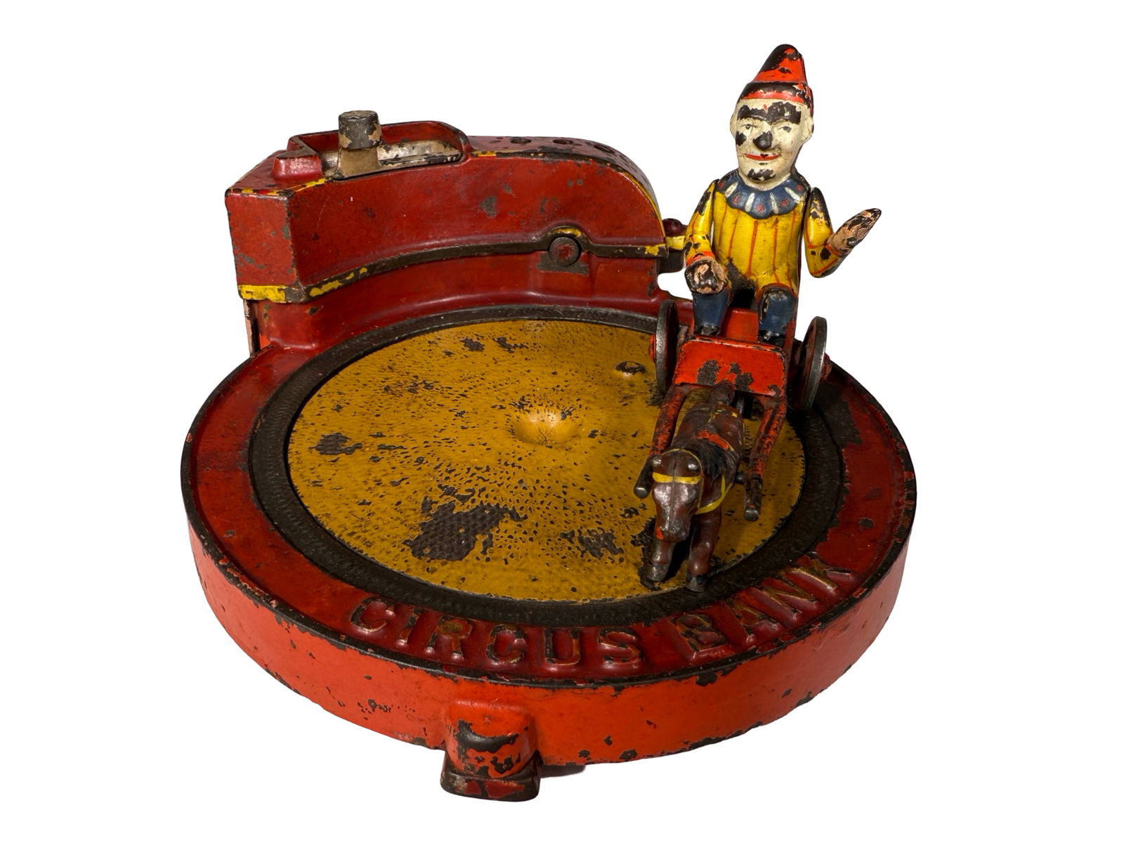 The Circus - Cast Iron Mechanical Bank: By Shepard Hardware. Buffalo, NY - Late 1880's. The Circus Bank is definitely one of Shepard's most exciting creations. It depicts a clown circling the sawdust of the center ring in his horse cart. As