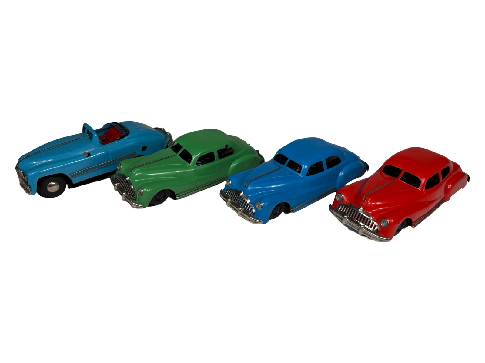 Four Tri-ang Sedans: Made by Minic Toys. English - 1950's. 7" Long.