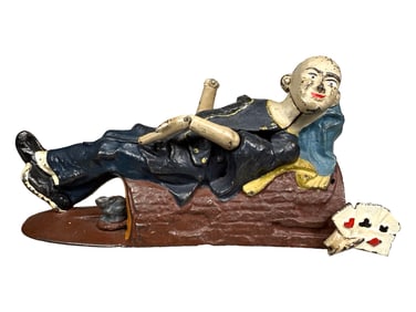 Reclining Chinaman - Cast Iron Bank