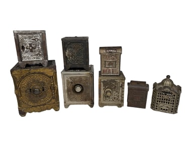 Eight Cast Iron Still Banks