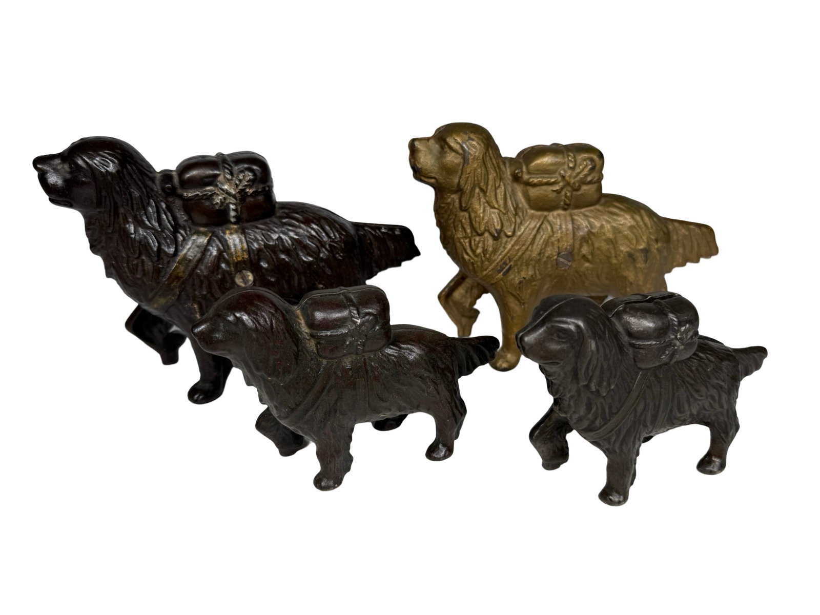 Four Dog Banks: American - 1915. 5 3/4" to 8" Long.