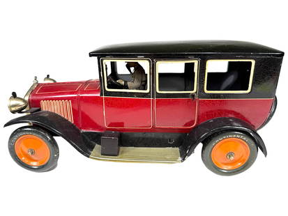 Iconic Art Deco Limousine - Windup Toy: Made by the Gebruder Bing Company. Germany - Circa 1928 - 11" Long. The design and execution of this classic art deco era limousine is truly exceptional. Special features include, a bright silver radi