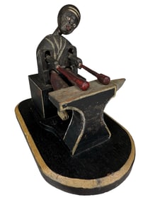 Musician Playing an Anvil Kobe Toy
