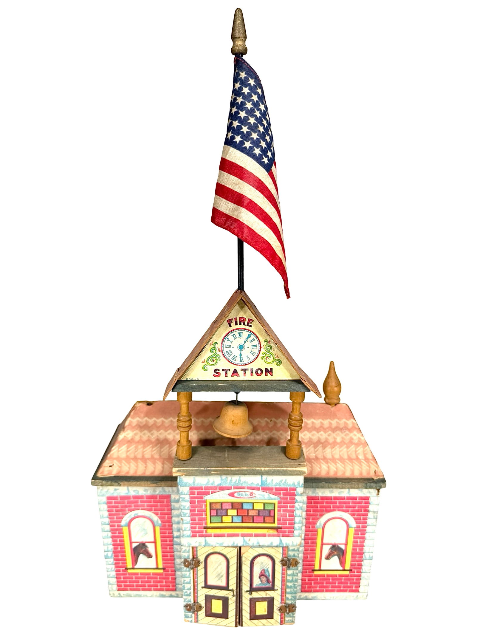Fire Station with Bell - Paper Litho Toy: Made by Bliss Mfg. Company. Pawtucket, RI - 1900's. 10" Long x 12 1/2" Tall. This is a really charming paper litho Fire House. The Carl & Linda Thomas Collection.