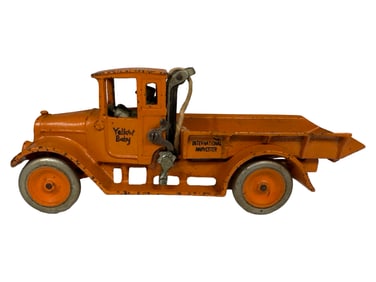 "Yellow Baby" International Harvester Dump Truck (Very Scarce) - Cast Iron Toy