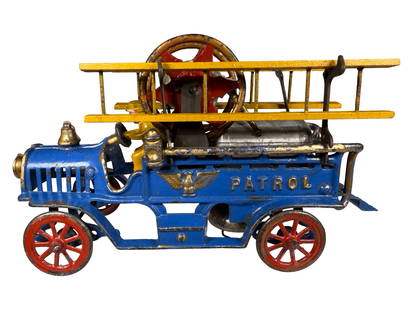 Fire Patrol - Combination Truck - Cast Iron Toy: Extremely Rare (Maybe Unique). Made by Hubley Mfg. Company. Lancaster, Pa. - 1915 - 11" L. From the Frank Kidd Collection. We have not seen this extremely rare toy before. The vehicle carries ladders,