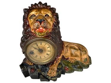 Recumbent Lion Blinking Eye Clock
