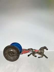 American Tin Horse on Platform Pulling a Cylinder
