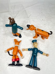 Four Wooden Jointed Figures