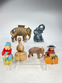 Twelve Assorted Banks, Various Heights, Most are Cast Iron