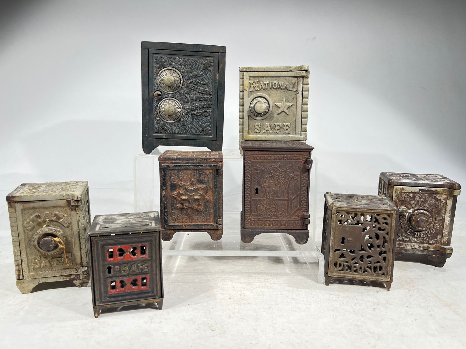 Eight Cast Iron Safe Banks (1 of 3)