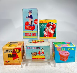 Eight Plastic Mechanical Banks in Original Boxes
