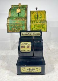 Seven Tin/Steel Banks, Varying Sizes