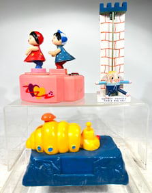 Seven Modern Plastic Mechanical Banks