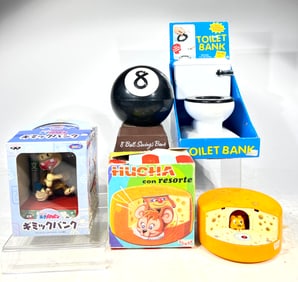 Four Plastic Modern Mechanical Banks