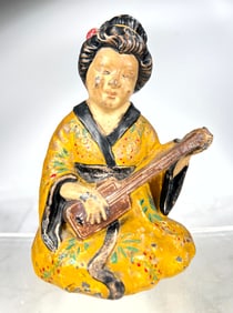 Japanese Girl Playing a Sitar Cast Iron Doorstop