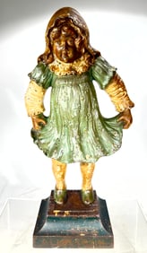 Girl Holding Dress Cast Iron Doorstop