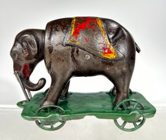Elephant with Tusks on Wheels Cast Iron Mechanical Bank - Very Rare