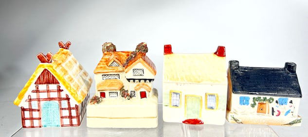Four Ceramic Cottage Still Banks