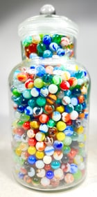 Assorted Machine Made Marbles In a Glass Jar at Least 1000 Marbles