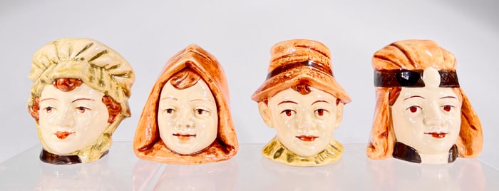 Four Porcelain Bust Banks