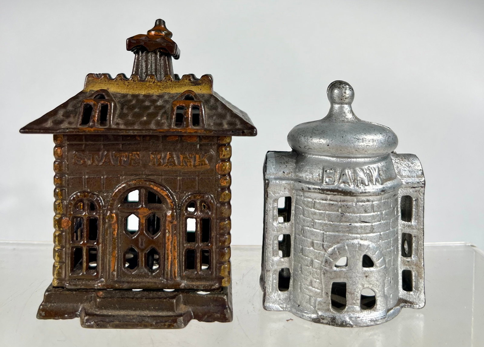 Two Cast Iron Building Banks: American 1900- 3 1/4"/ 4 1/4" T