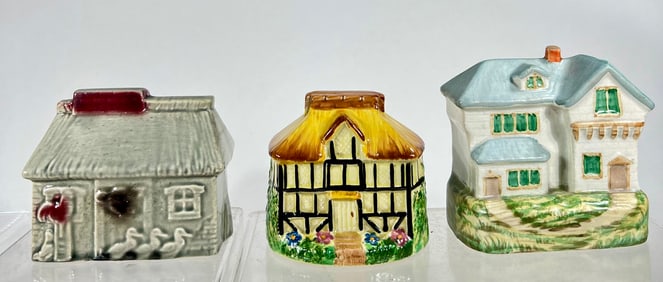 Three Ceramic Cottage Banks