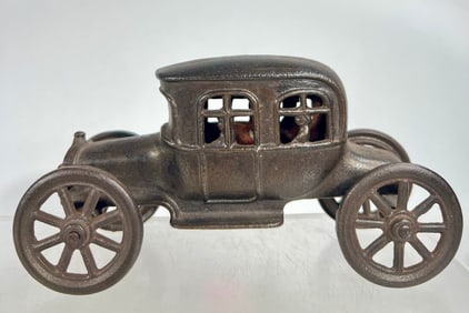 Auto w/ Four Passenger Cast Iron Bank