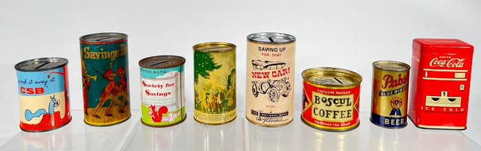 Eight Tin Advertising Banks