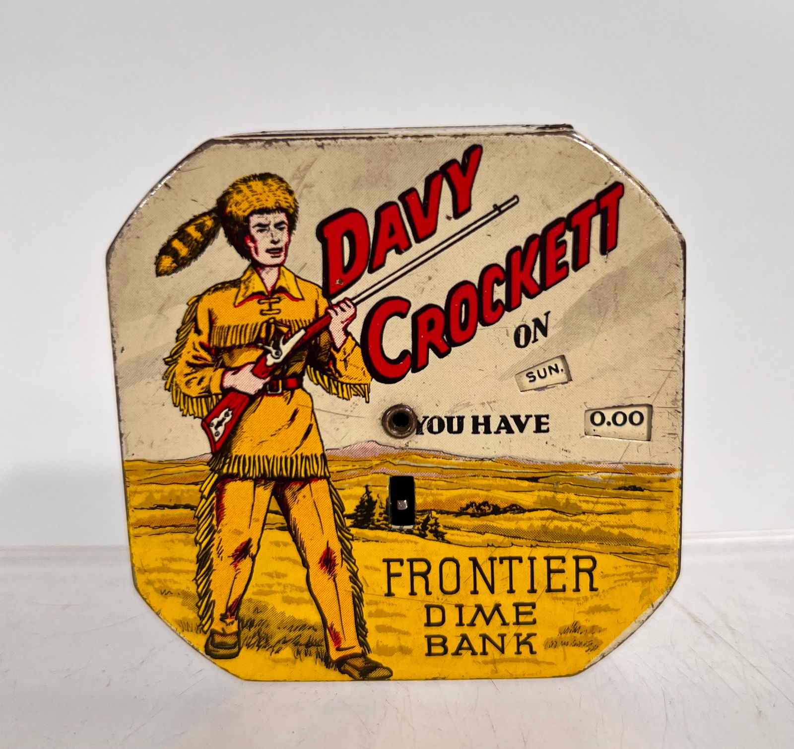 Davy Crockett Pocket Dime Register Bank (1 of 2)