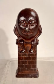 Humpty Dumpty on a Wall Cast Iron Still Bank