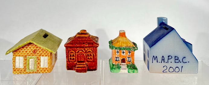 Four Ceramic Building Banks