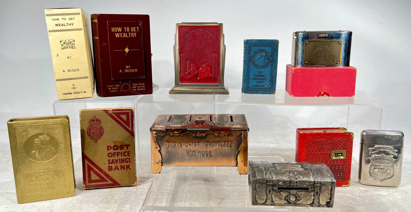 Nine Assorted Still Banks (1 of 3)