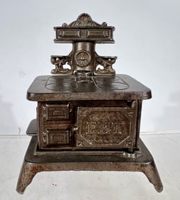 Pet Stove Cast Iron Still Bank