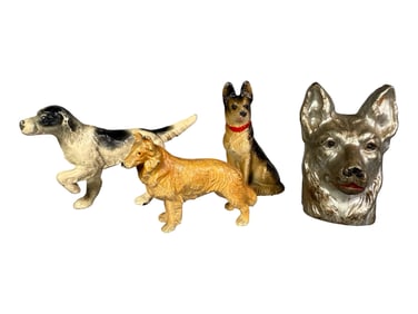 Four Dog Paperweights