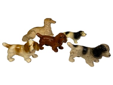 Four Cocker Spaniel / Wolfhound Cast Iron Paperweights