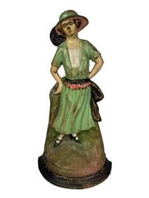 Woman with Hat and Ruffled Dress Doorstop