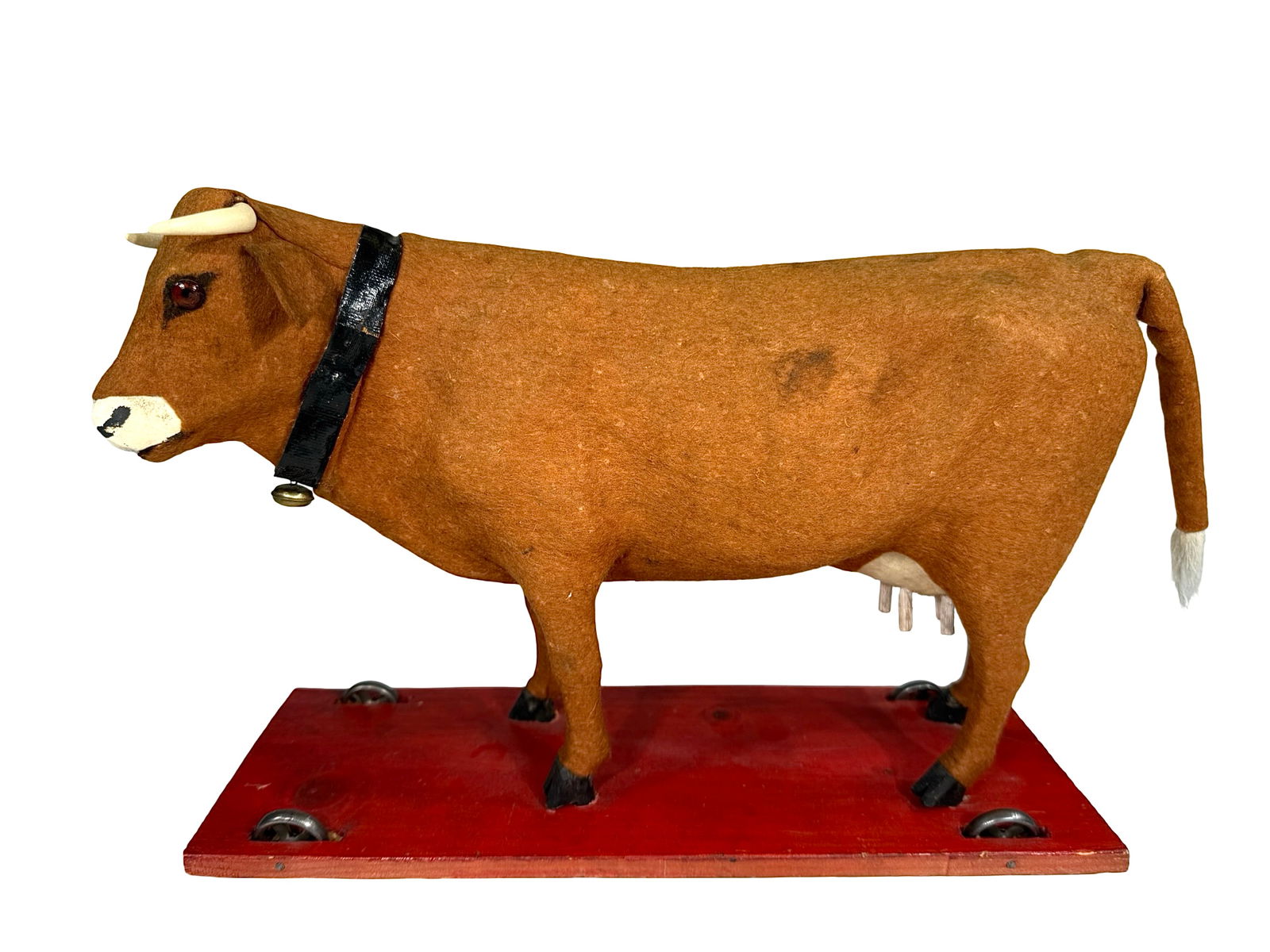 Cow on Platform with Mooing Sound: German - 1920's. 12 1/2" L x 4 3/4" D x 9" T.