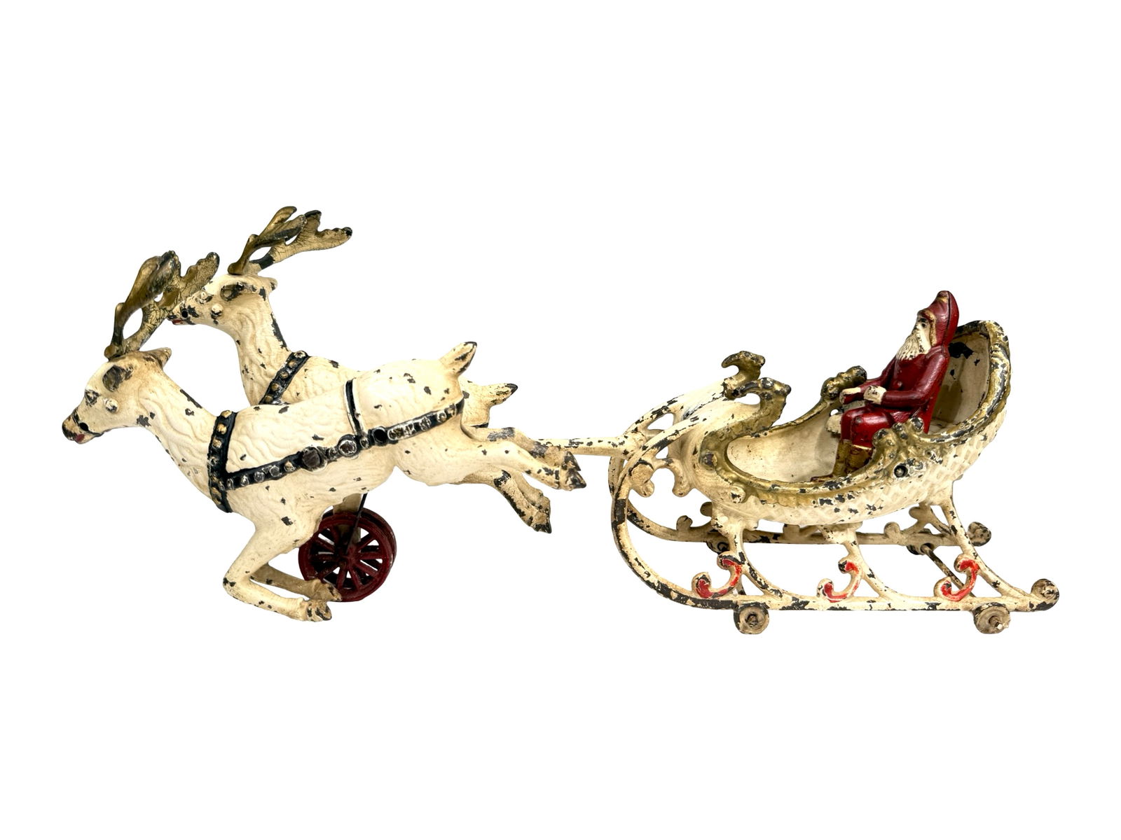 Santa's Reindeer Sleigh Iron Toy: Made by the Hubley Mfg. Company. Lancaster, Pa. - Circa 1910 - 15" L x 7" T.
