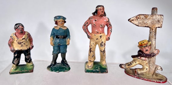 Four Paperweights/ Bottle Openers